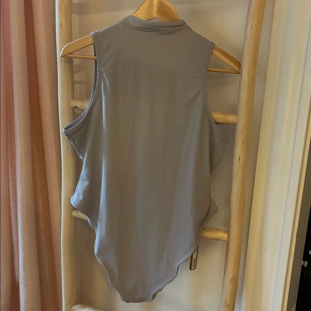 Skims recycled swim sleeveless one piece.